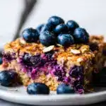 Lightly grease a 7x11 inch rectangular baking dish and spread the oat mixture in it Recipe