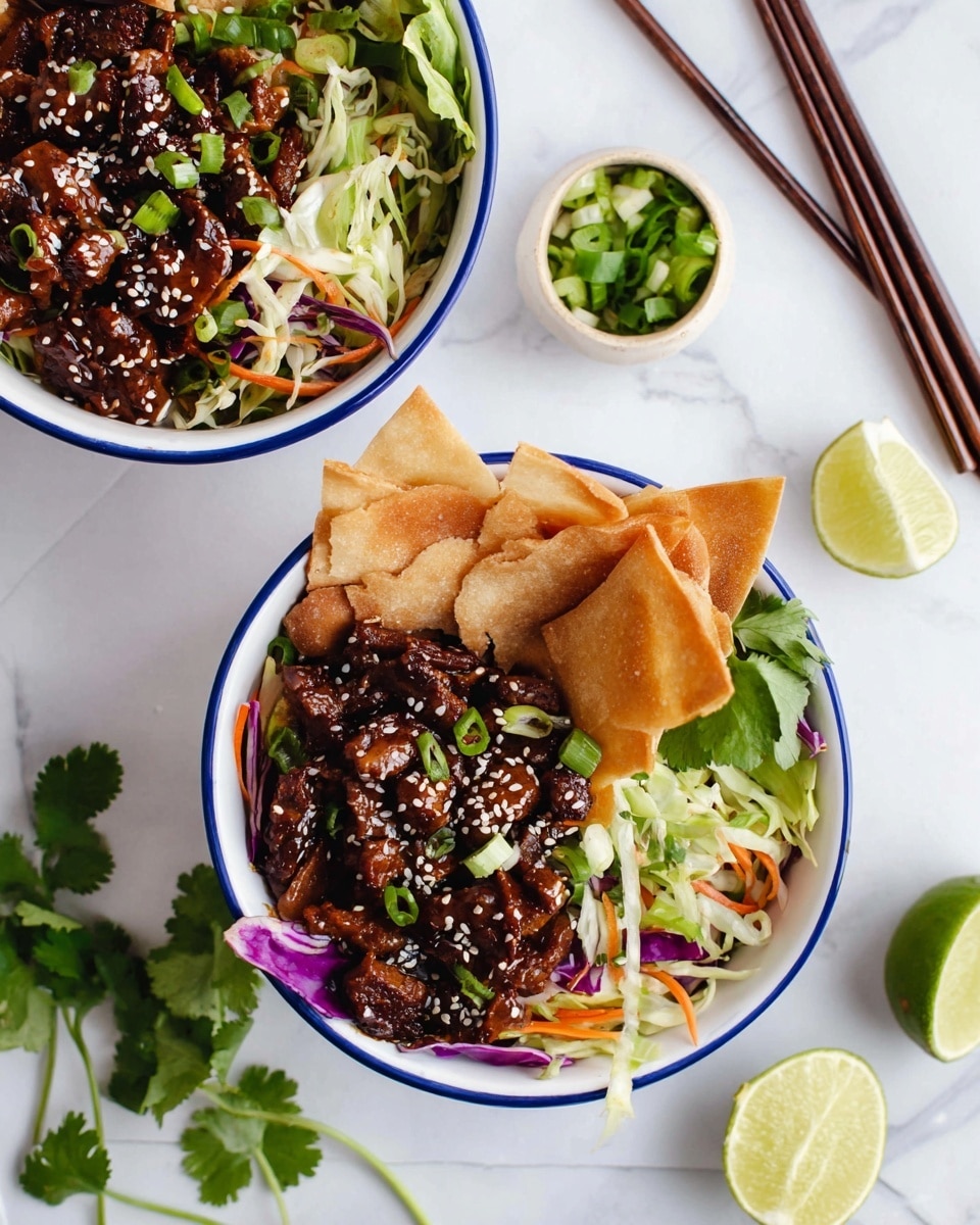 Two white bowls with blue rims sit on a white marbled surface, each filled with a colorful layered meal. The base layer consists of shredded green and purple cabbage mixed with thin carrot slices. On top of that, there is a dark brown, glossy stir-fried meat with a sticky texture, sprinkled with black and white sesame seeds. Crisp light brown fried pita strips are placed on one side of each bowl. A fresh green lime wedge rests beside the pita strips, adding a pop of color. Bright green herbs and chopped green onions are scattered on top, adding freshness. Near the bowls, some cilantro sprigs, lime wedges, and dark brown chopsticks are arranged, contributing to the presentation. Photo taken with an iphone --ar 4:5 --v 7