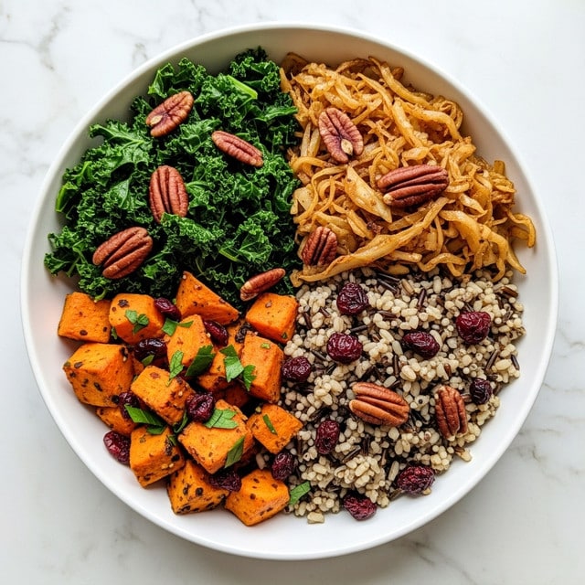 A white bowl filled with four distinct layers: bright orange roasted sweet potato cubes sprinkled with dried cranberries and green herbs in the front left, a mound of mixed wild and brown rice speckled with red dried cranberries on the front right, dark green sautéed kale mixed with light brown pecan halves on the back left, and a serving of cooked yellow cabbage topped with pecans on the back right. All ingredients have a fresh, slightly shiny texture. The bowl is placed on a white marbled surface. photo taken with an iphone --ar 4:5 --v 7