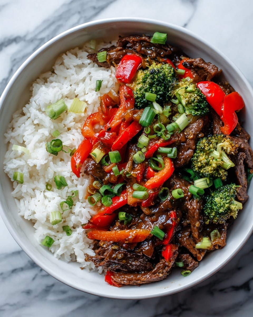 A bowl filled with three main layers is shown: at the bottom, a layer of white rice with soft, fluffy texture; the middle layer consists of tender, brown beef strips coated in a shiny, dark sauce; the top layer is a mix of colorful vegetables including bright red and green bell pepper slices, small broccoli florets, and chopped green onions scattered on top, all sitting in a white bowl placed on a white marbled texture. Photo taken with an iphone --ar 4:5 --v 7