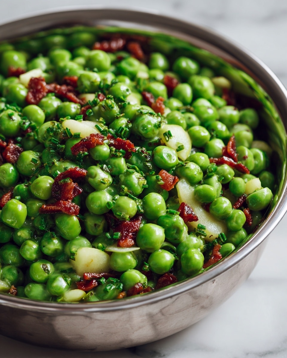 A close-up view of a bowl filled with fresh green peas as the main layer, mixed with small, irregular chunks of yellow and white pear pieces scattered evenly throughout. Small crispy brown bacon bits are spread on top, adding a crunchy texture, along with finely chopped green herbs sprinkled over the entire dish. The bowl is white with a shiny texture, sitting on a surface with a white marbled texture. photo taken with an iphone --ar 4:5 --v 7