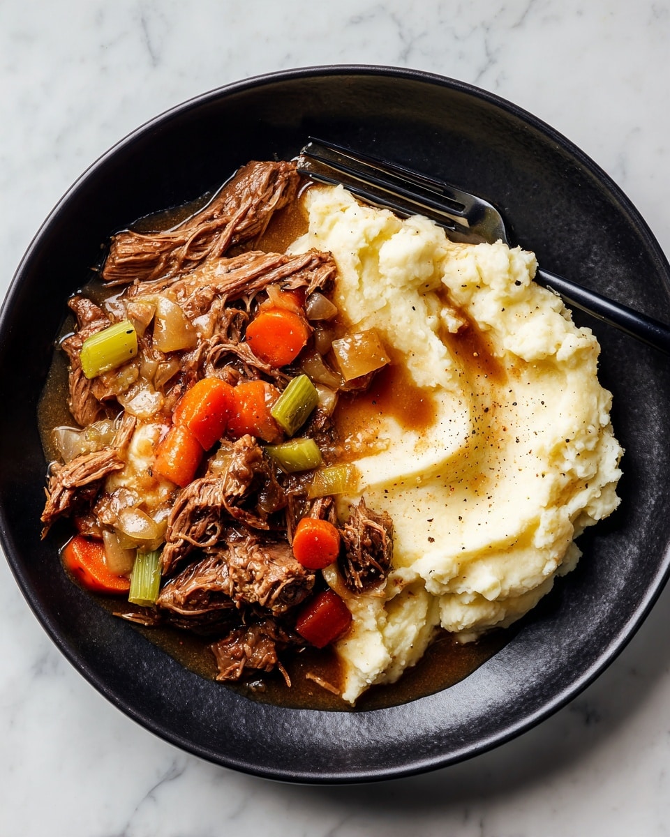 A dark plate shows shredded cooked beef mixed with chunks of cooked light green celery and small pieces of orange carrot, placed on the left side. On top and around some vegetables are glossy brown sauce and gravy that add shine. To the right of the beef, there is a large serving of white mashed potatoes with a smooth, soft texture, slightly curved with visible pepper bits on top. Some gravy slightly covers the mashed potatoes, close to a black fork resting on the plate’s edge. The plate sits on a white marbled surface. photo taken with an iphone --ar 4:5 --v 7